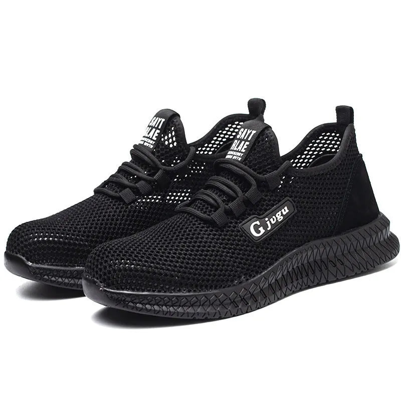 Men's black Flyknit low-top work shoes with steel toe cap on grey background