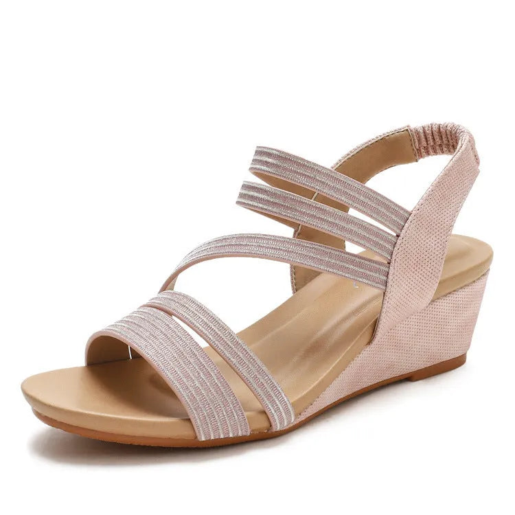 Women's platform sandals in gold colour with a soft leather sole and artificial PU upper