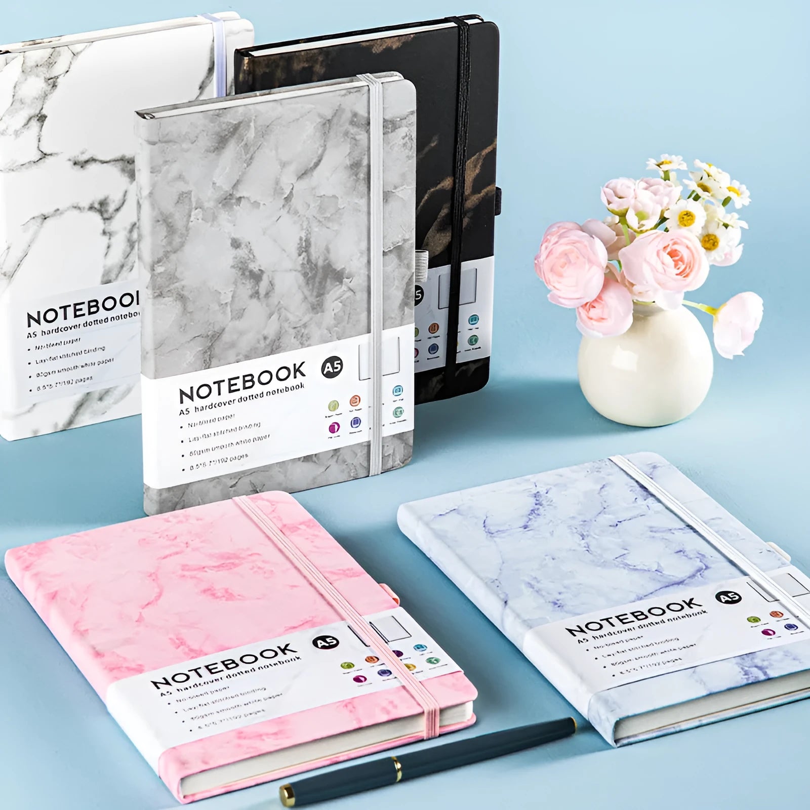 A5 soft touch PU leather strap diary open showing lined pages, closed with elastic band, in a choice of colours.