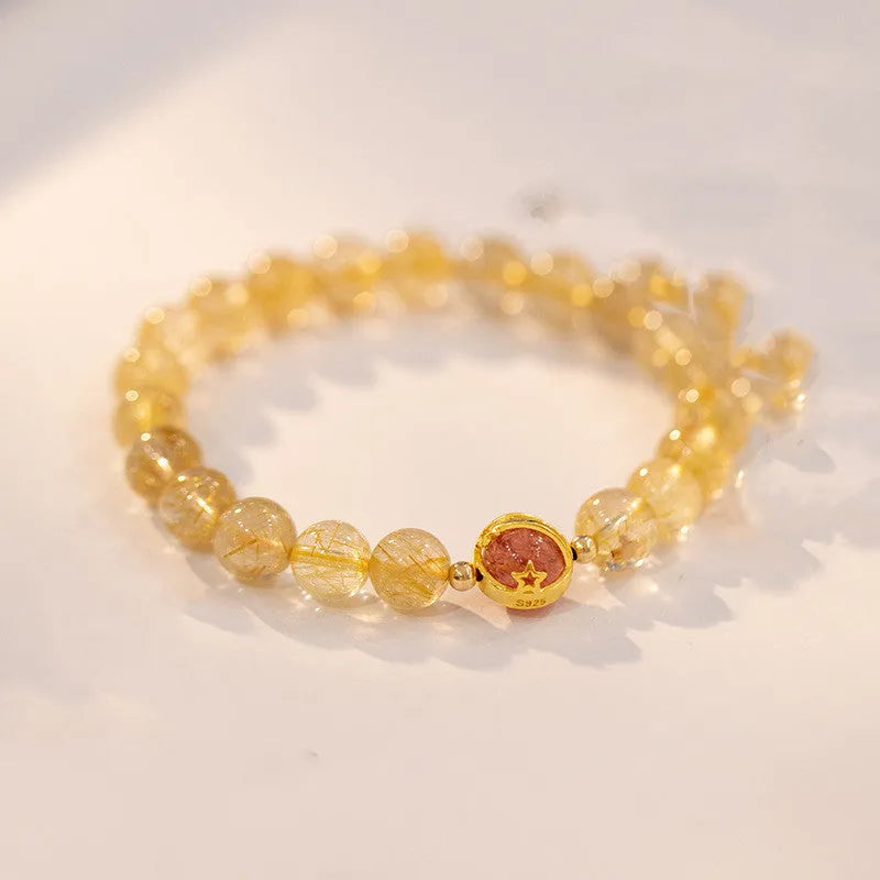 Gold rutilated quartz crystal bracelet with diamond shaped beads in Korean style design