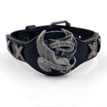 Black leather geometric bracelet with an eagle watch clasp, showing tapered width.