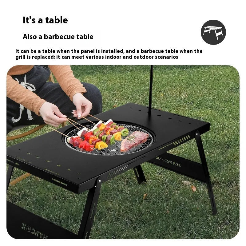 Folding multifunctional travel barbecue table with black steel construction and integrated cooking surface