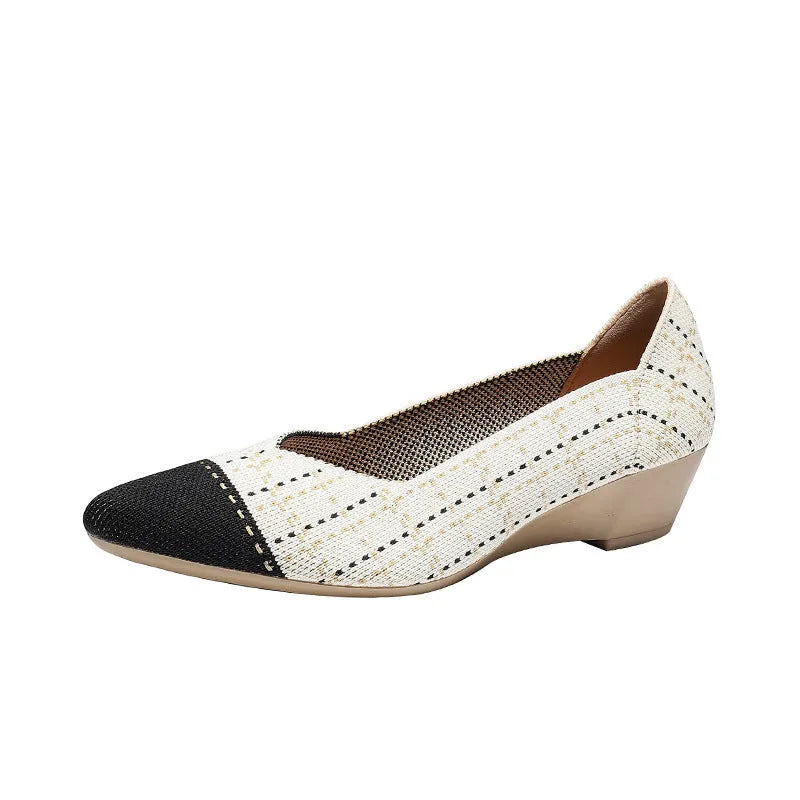 Women's casual wedge knitted shoes in apricot with a mid heel and rubber sole.