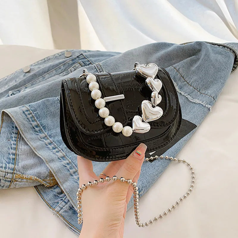 Women's laser pearl finish PU crossbody bag in horizontal square shape with single shoulder strap