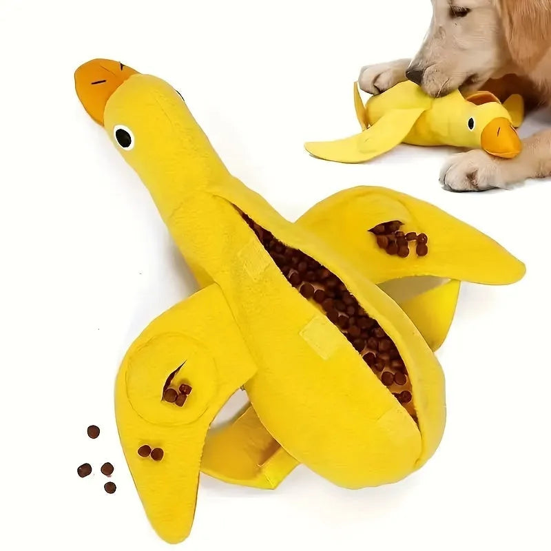 Yellow teddy duck dog toy with food leak openings for treat dispensing during training and play
