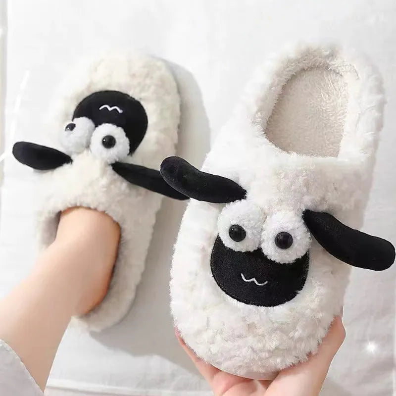 Brown lamb thermal cotton slip-on slippers with sewn PVC sole on wooden floor