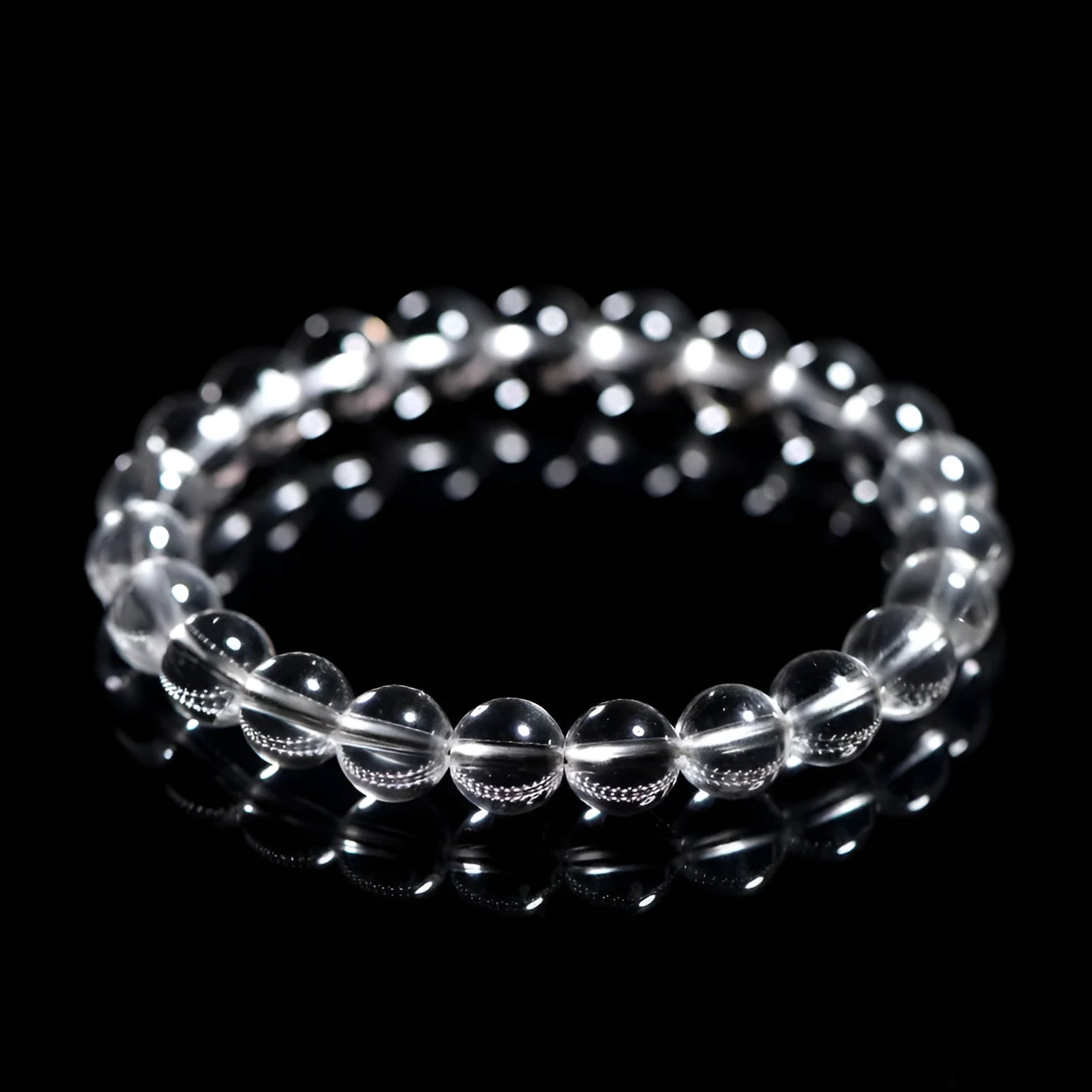 Natural white crystal bracelet with Donghai water round beads showing geometry design on wrist