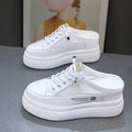 Women's white platform shoes with mesh detail and round toe design