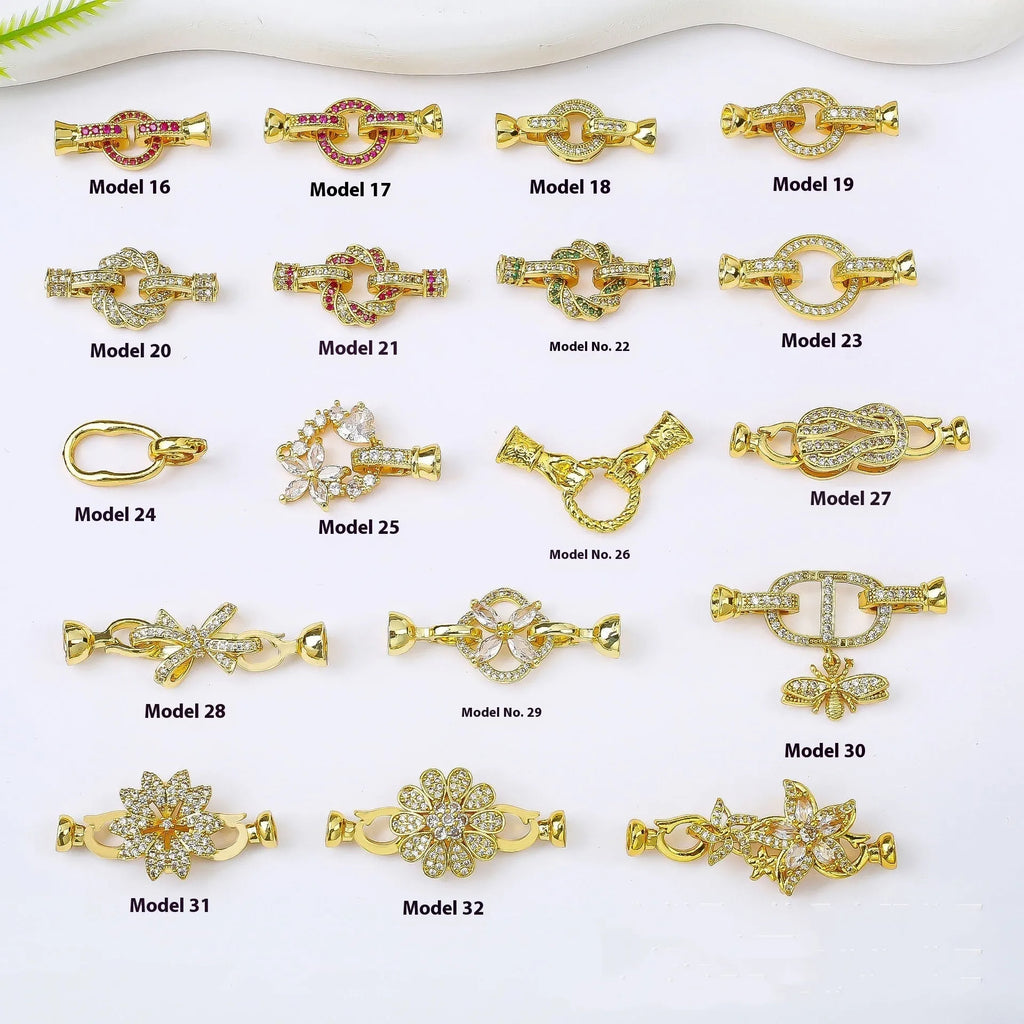 Small gold-plated necklace chain buckle on a white background, a DIY jewellery finding.