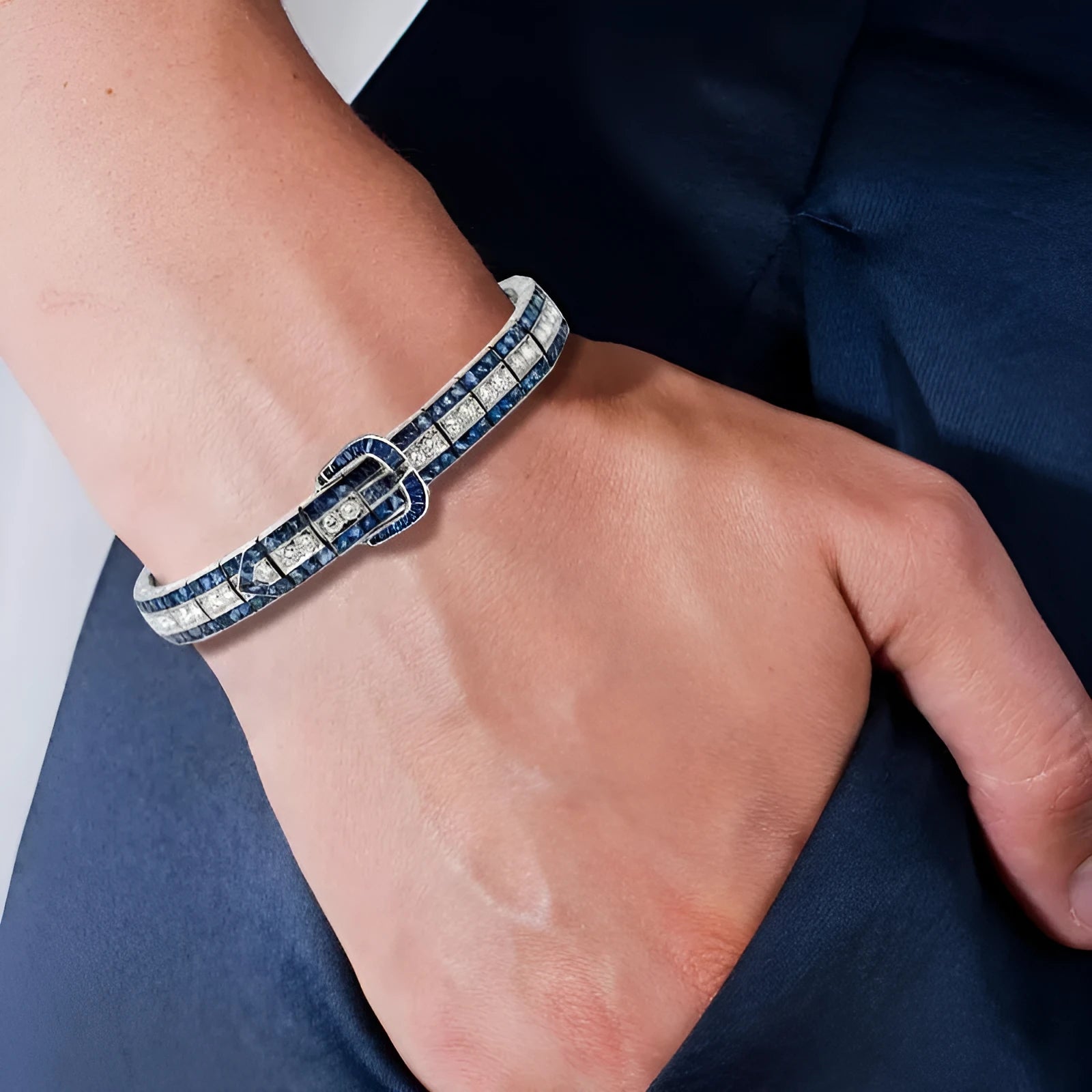 High-carbon drill gold-plated 925 silver bracelet in vivid blue on white background