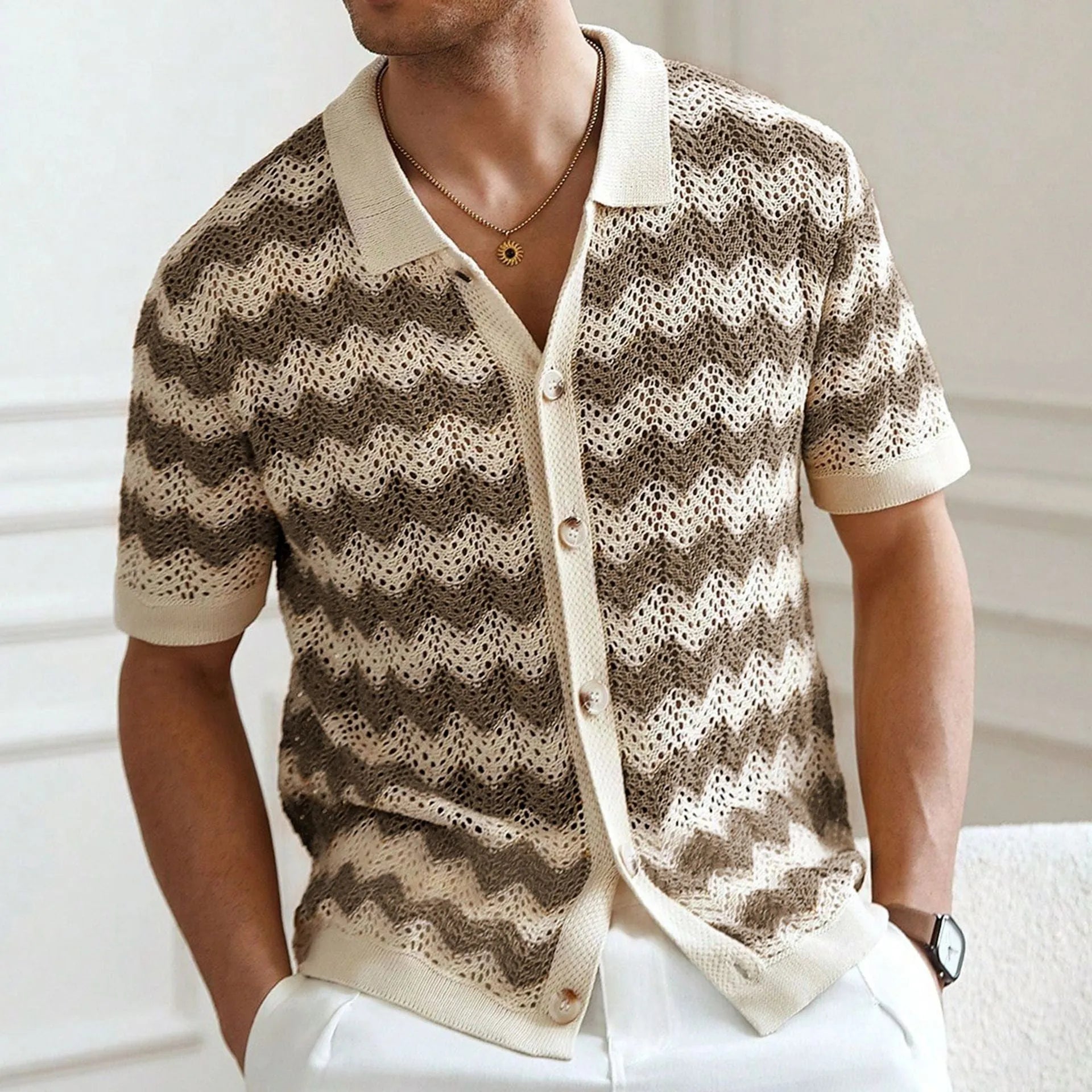 Yellow, blue, and brown short-sleeved sweater with a hollow jacquard corrugated texture.