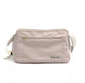 Off-white crossbody bag for small breed dogs with adjustable strap pet carrier sling