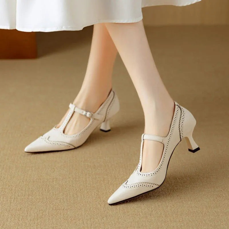 Women's black and white stiletto heels with skull engraving pattern, French vintage style, on a high heel over 8cm.