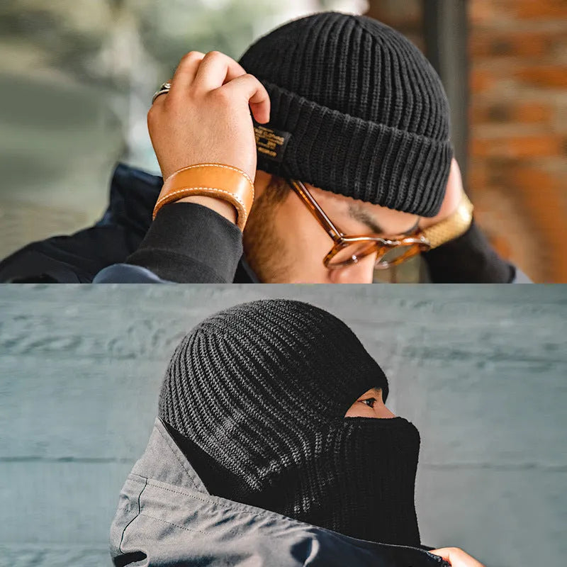 Vintage knitted melon skin warm beanie in black with patch detail on model wearing street-style outfit