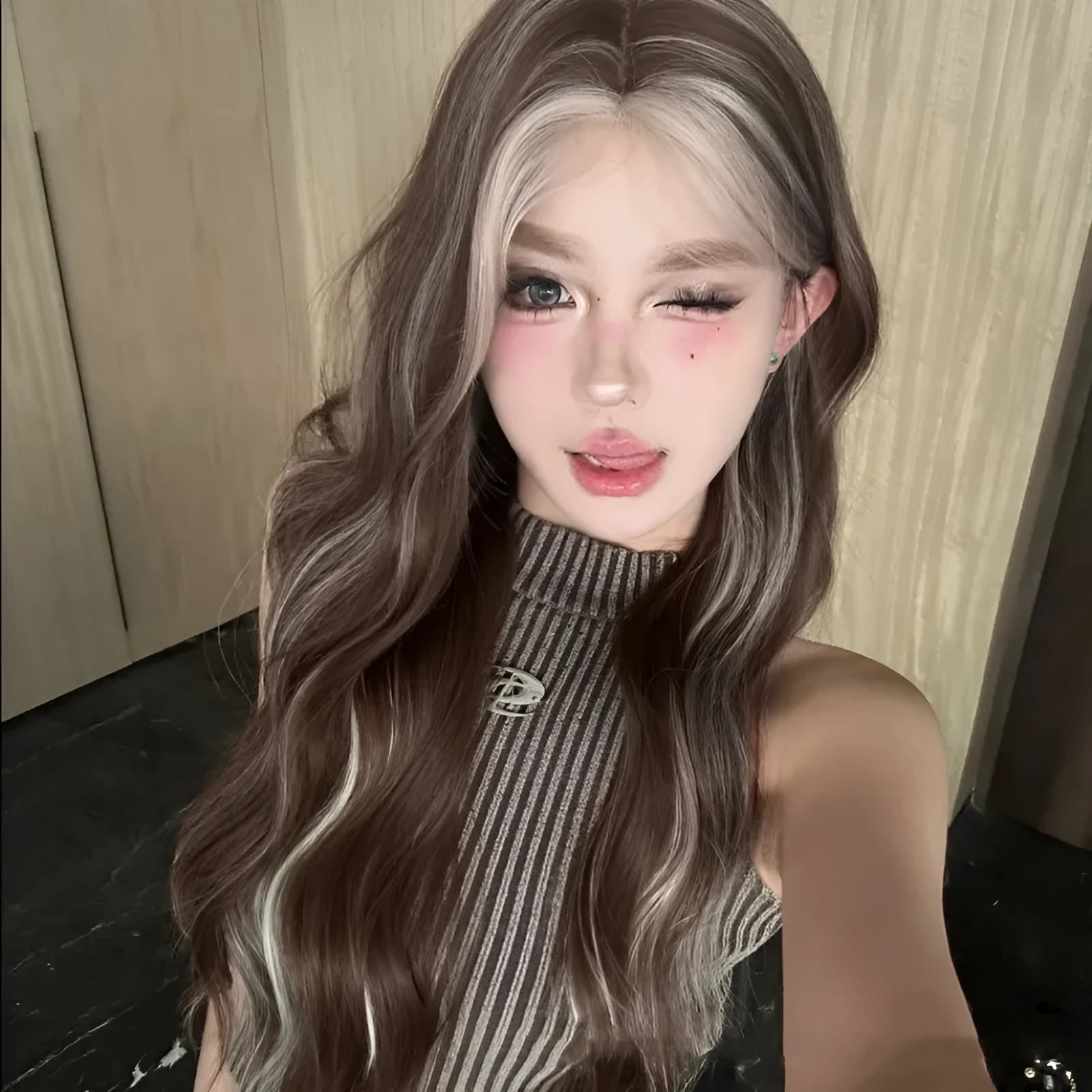 Long curly wig with gray golden highlights and lace base for natural hairline