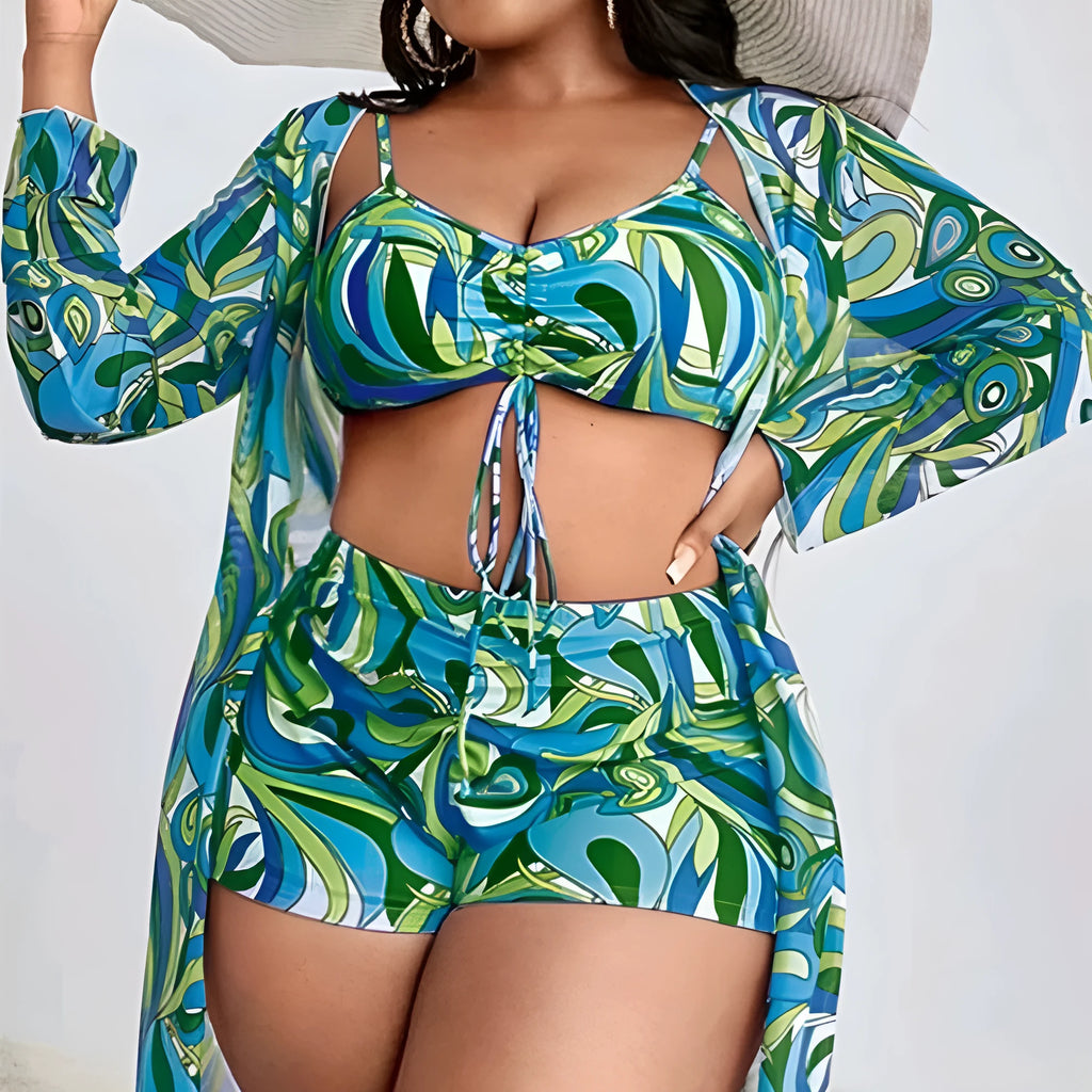 Women's floral print polyester bikini set with bra, briefs, and cardigan.
