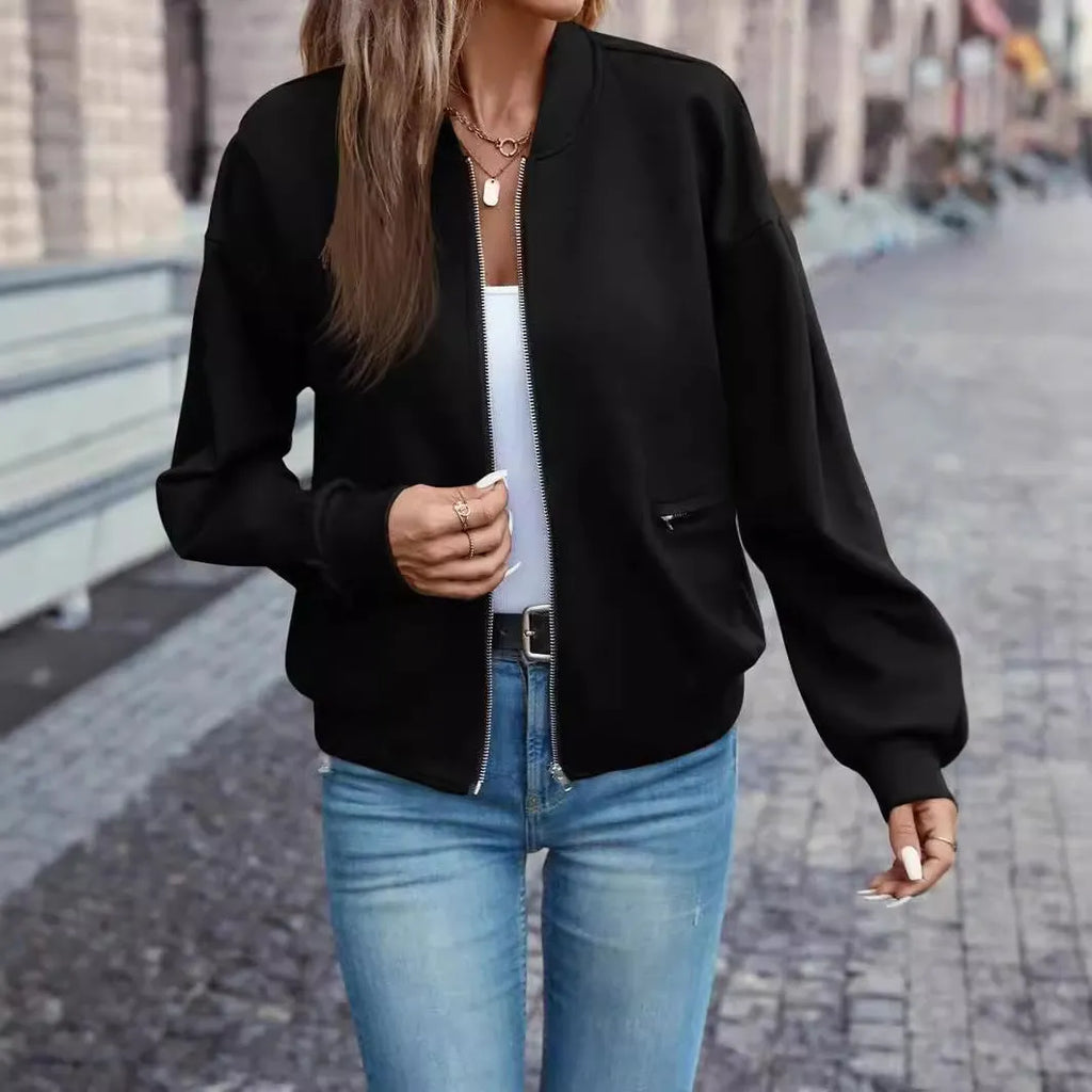 Black women's casual zip-up jacket with long sleeves and faux pockets
