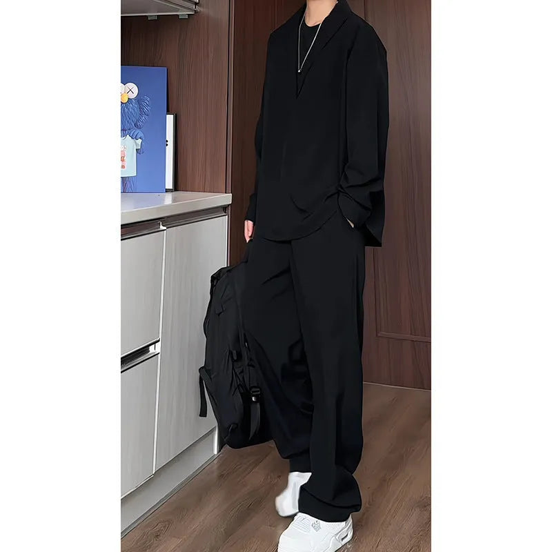 Men's black casual two-piece suit with long sleeve polo shirt and trousers in slim fit design