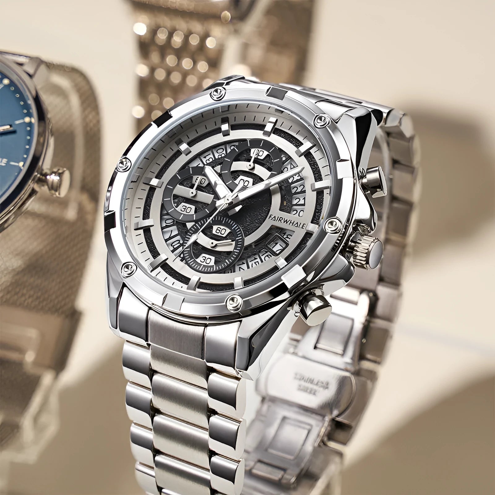 Men's stainless steel luminous quartz watch with a blue dial on a steel bracelet.