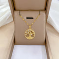 Gold-plated necklace with lucky tree rhinestone pendant and mother pearl centrepiece on an adjustable chain.