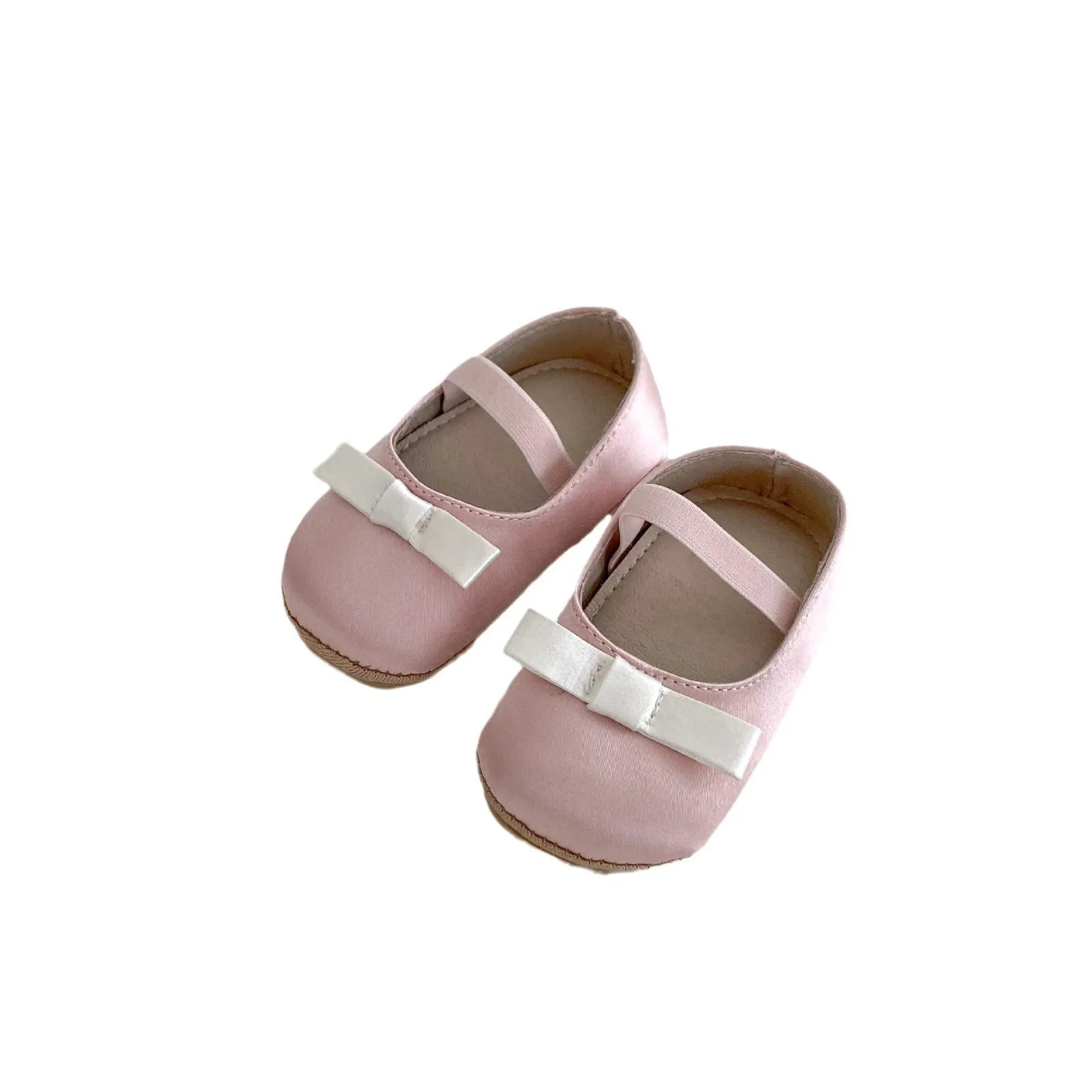 Cute baby butterfly knot shoes in solid colour with bow detail, breathable cloth and rubber sole