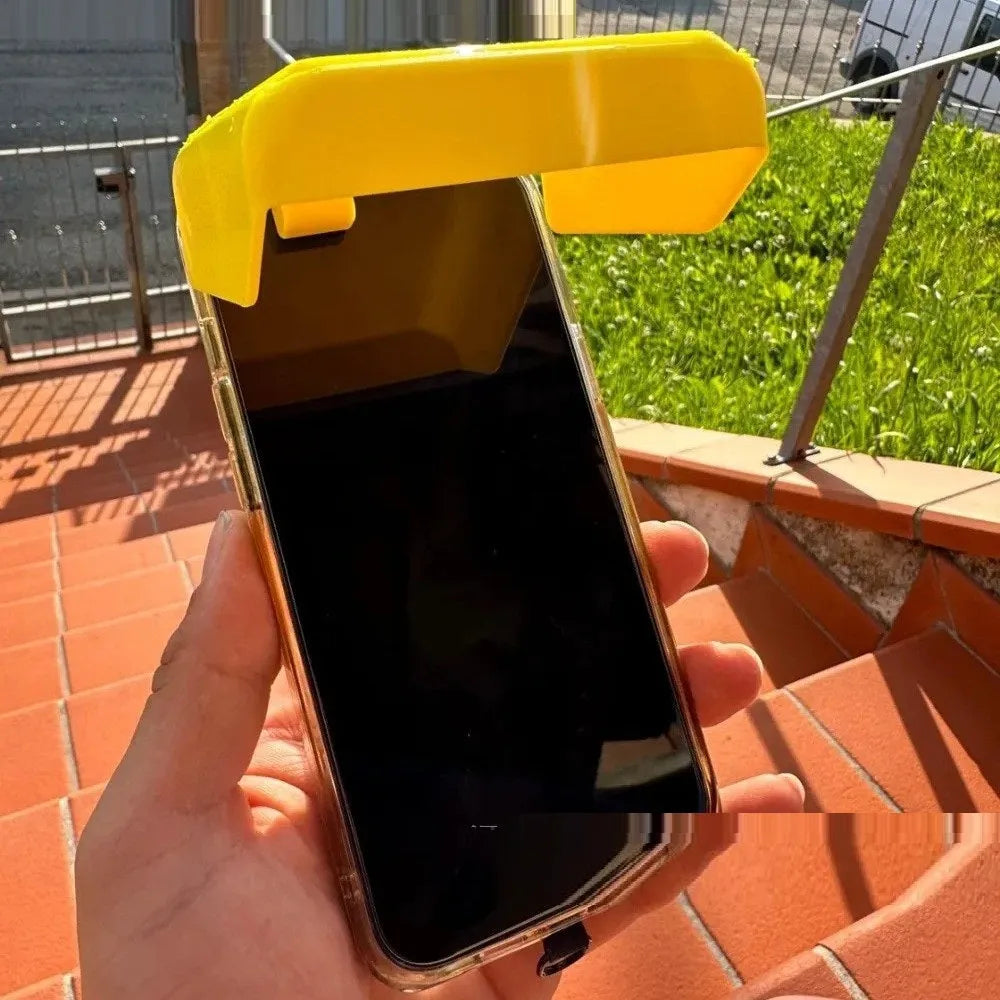 Yellow Creative Beachpool Phone Sunshade Holder clipping onto a smartphone.