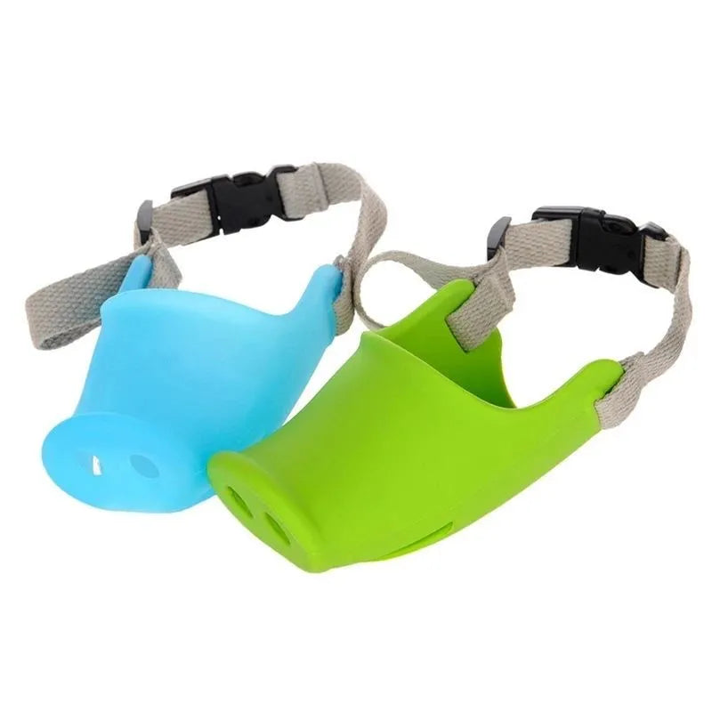 Blue and green silicone anti-bite mouth covers for dogs in two sizes on a white background.