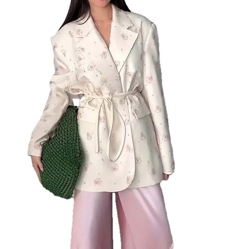 Women's suit jacket with lace-up waist detail in polyester fabric, available in multiple colours