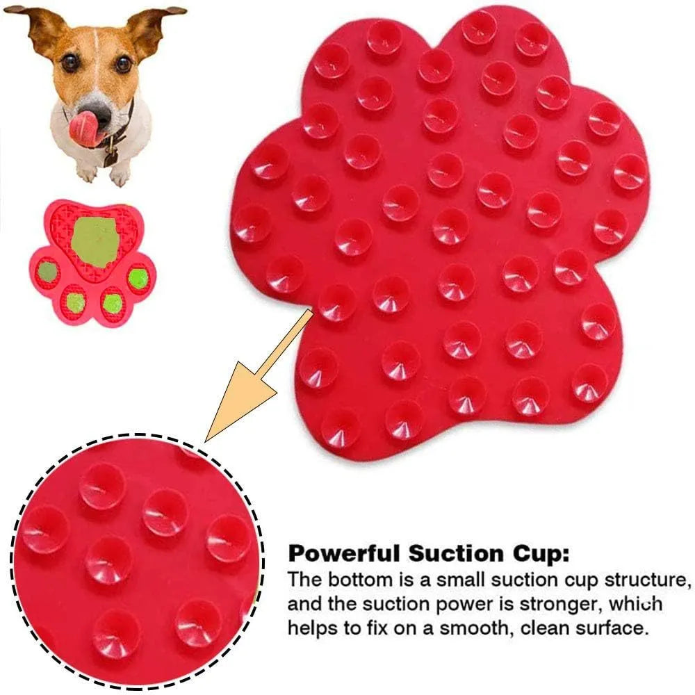 Blue silicone dog licking mat with bone texture and suction cups on back, for use with peanut butter during pet bathing.