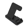 Black four-in-one wireless charging station with QC3.0 fast charging head for multiple mobile phones
