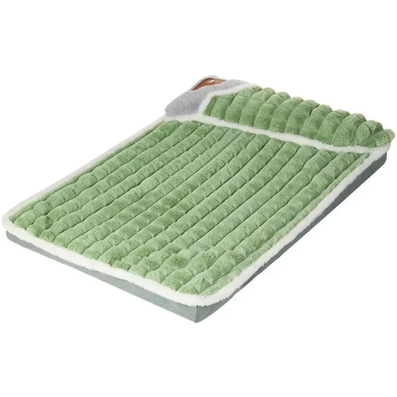 Large grey dog bed mat with removable cover shown next to a sleeping dog, demonstrating its size.