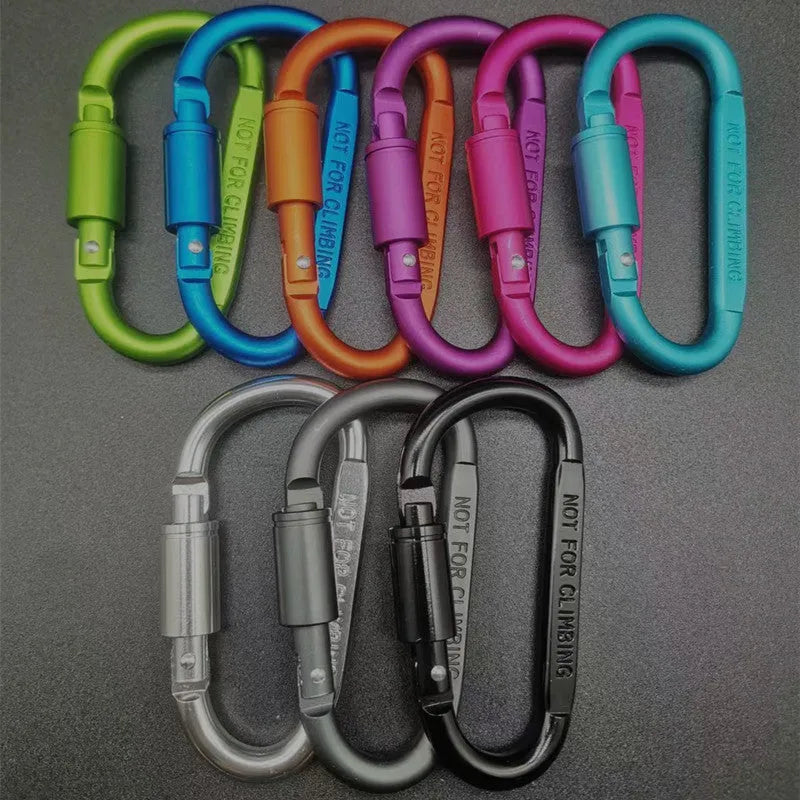Aluminium D-shaped carabiner with lock in multiple colour options on a grey background.