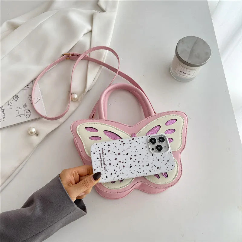 Women's square crossbody bag in PU leather with contrast detailing, shown in black, blue, pink, and white colour options