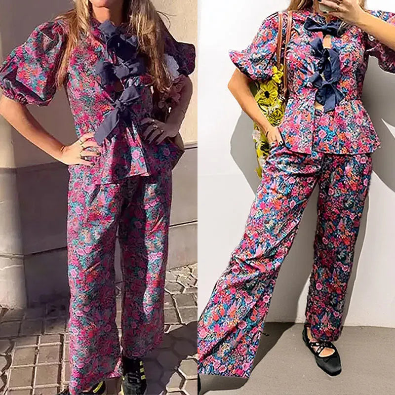 Women's floral print trouser suit set with puff sleeve blouse and matching trousers