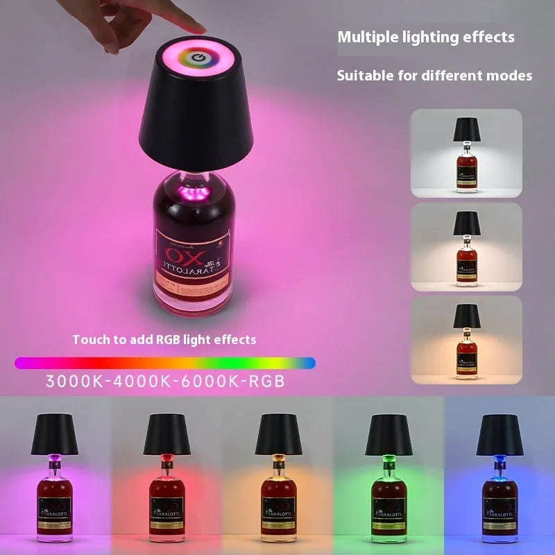 Plug-in wine bottle lamp with RGB tricolour dimming in wrought iron black finish on a table