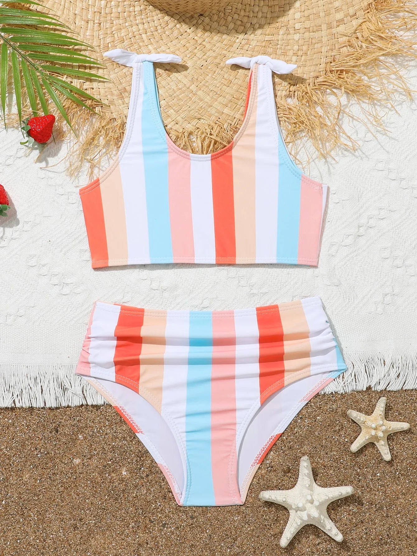 Girls' plaid print two-piece swimsuit set with bra top and briefs for swimming.
