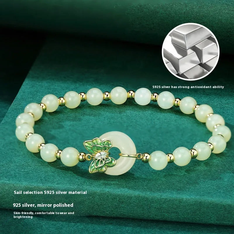 Cyan Hetian jade bracelet for women with a sterling silver butterfly inlay