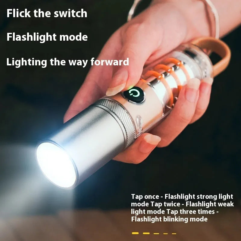 Orange 10W LED flashlight with dual light source, optical zoom, and USB charging cable