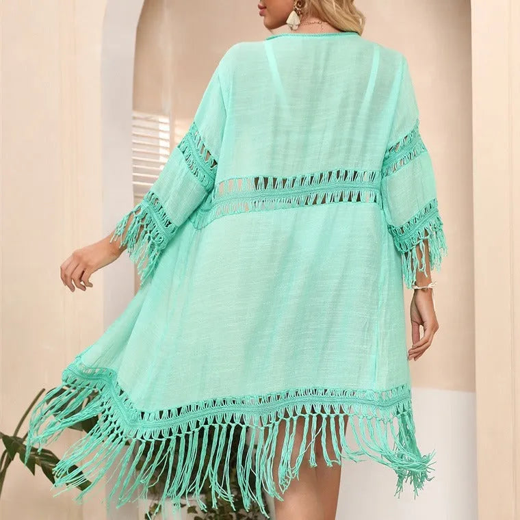 Hand-crocheted acrylic beach cover-up cardigan with tassel detailing in solid colour options