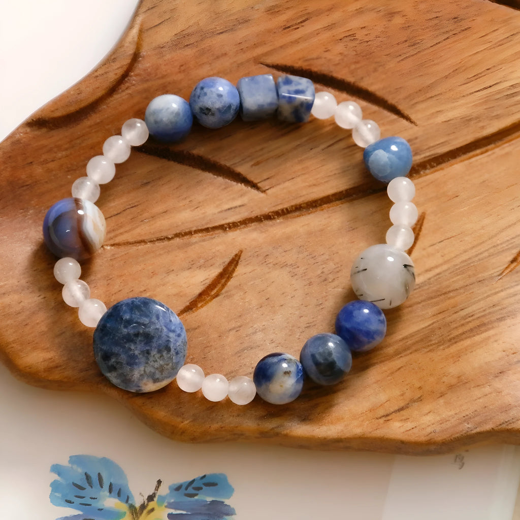 Hand-woven natural blue point and black hair crystal agate bracelet with geometric stone elements