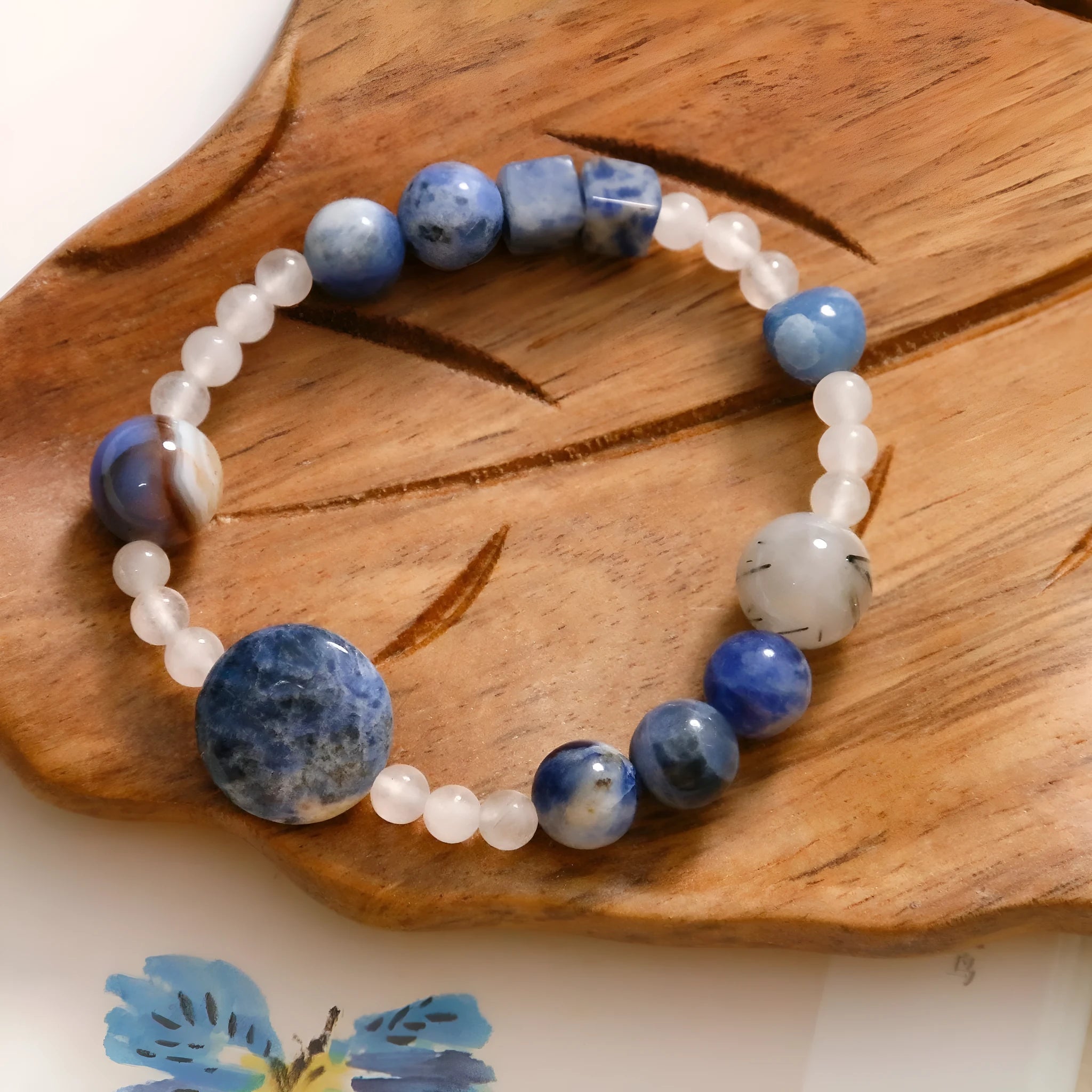Hand-woven natural blue point and black hair crystal agate bracelet with geometric stone elements