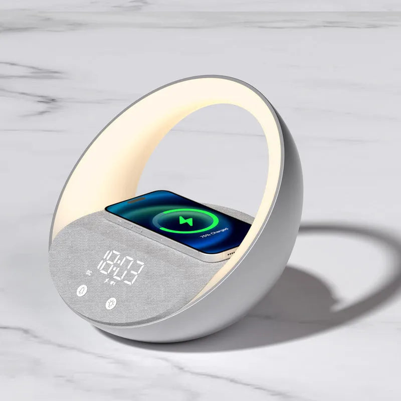 Beige and grey multifunctional wireless charging clock with Bluetooth speaker and LED light display.