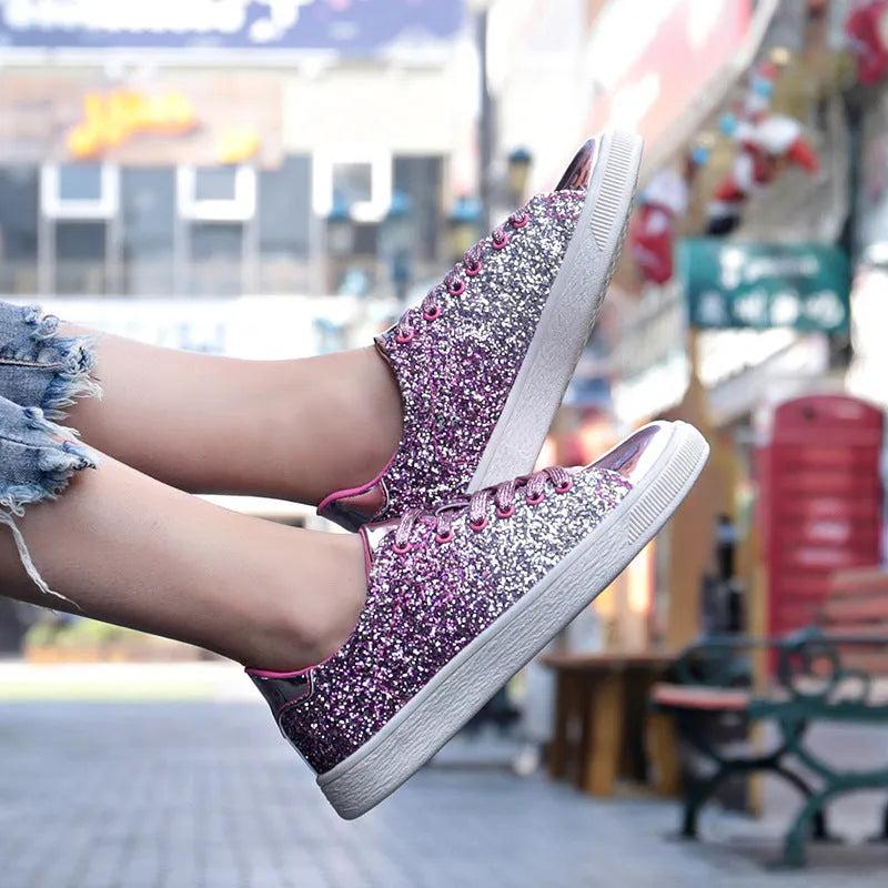 Women's black sequinned low-top lace-up shoes with a round toe and rubber sole