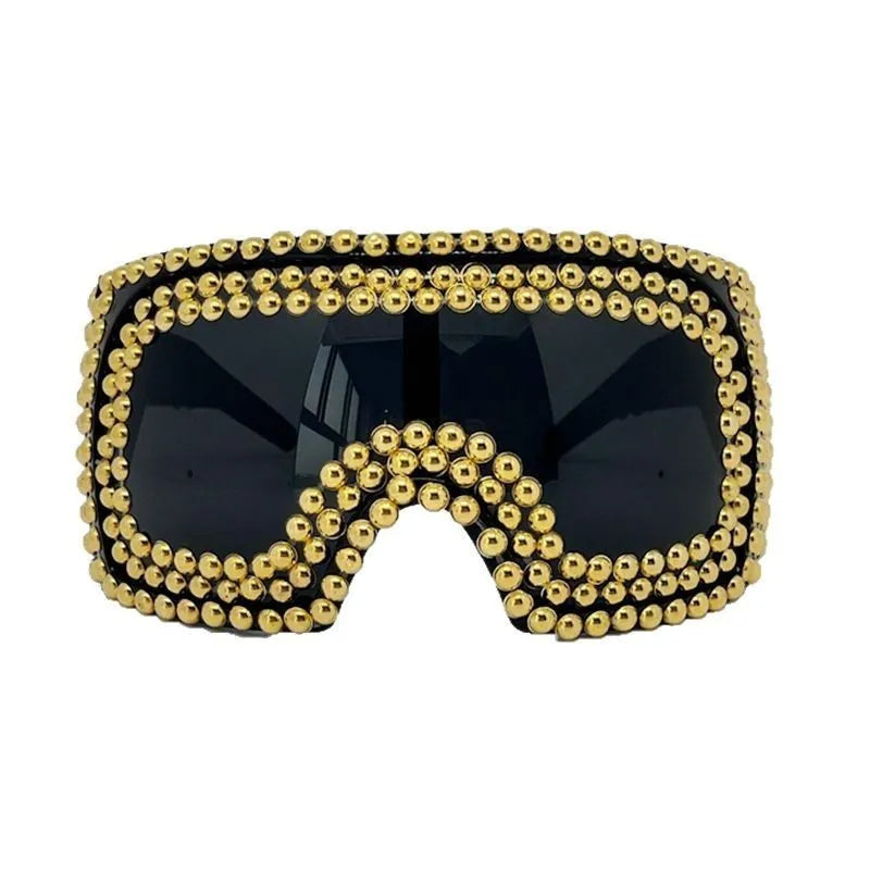 Men's punk-style sunglasses with a large square frame, rivet details, in silver or gold colour.
