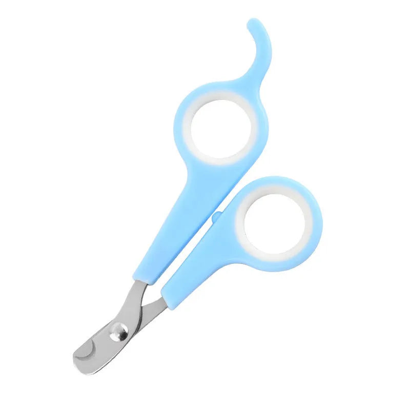 Mini pet nail clippers in plastic, blue white colour, on a light background
