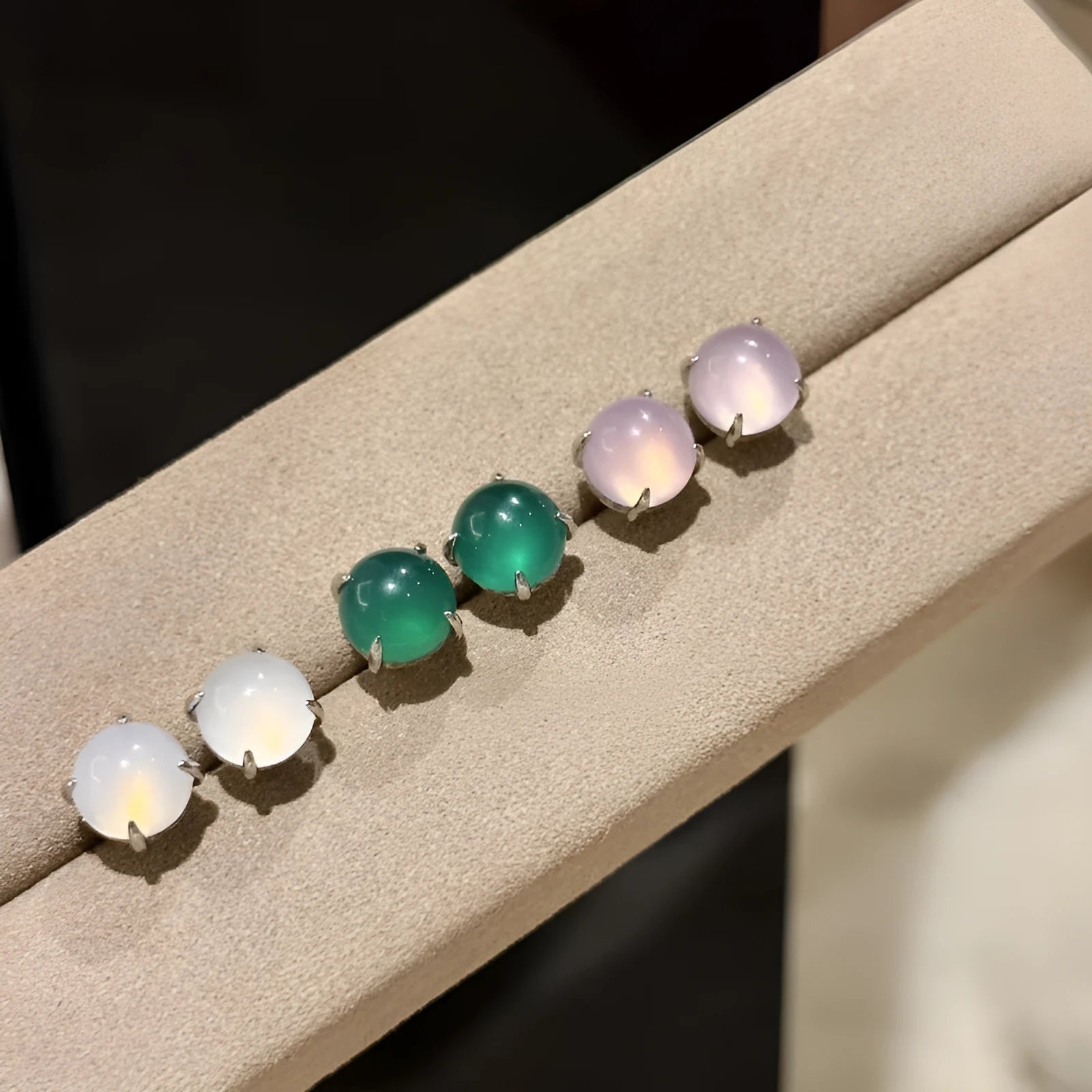 Chinese style geometric chalcedony stud earrings in four claw setting with round egg surface stones