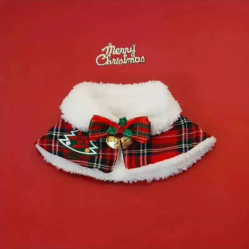 Red festive pet scarf with bell print draped on a dog's neck for winter and Christmas.
