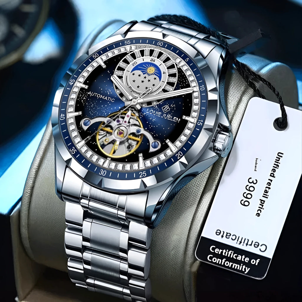 Men's silver alloy automatic mechanical watch with blue dial and stainless steel strap on wrist.
