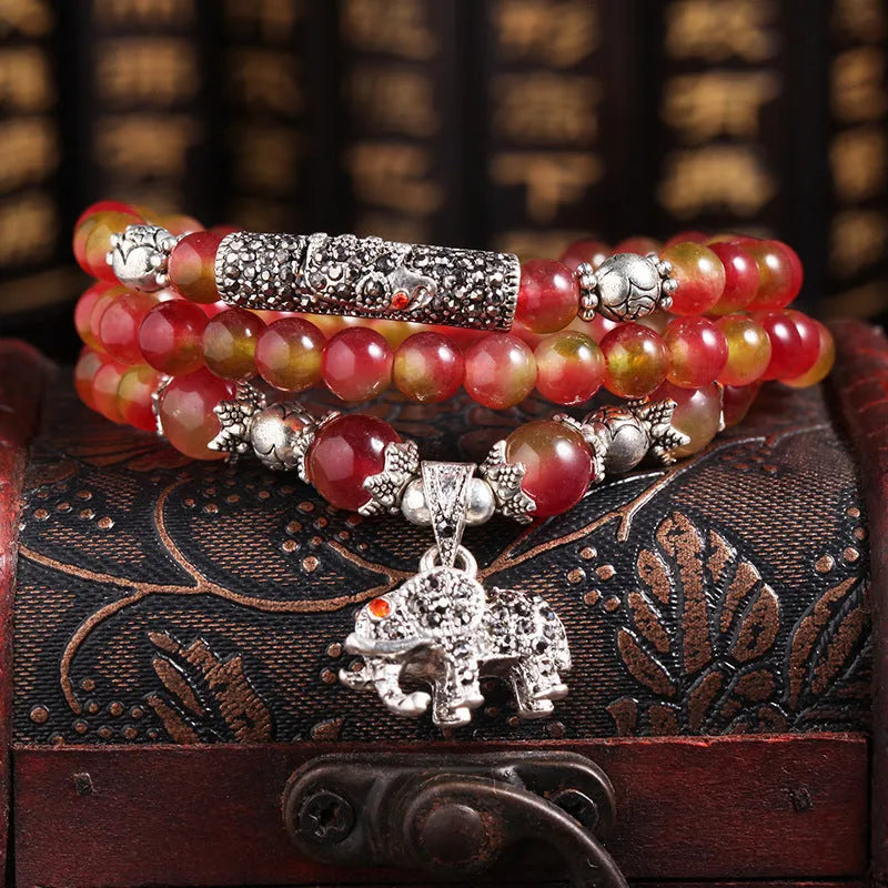 Handmade natural watermelon crystal bracelet with Chinese knot closure in national style.