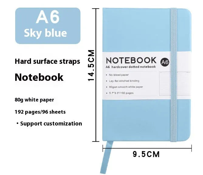 A5 soft touch PU leather strap diary open showing lined pages, closed with elastic band, in a choice of colours.